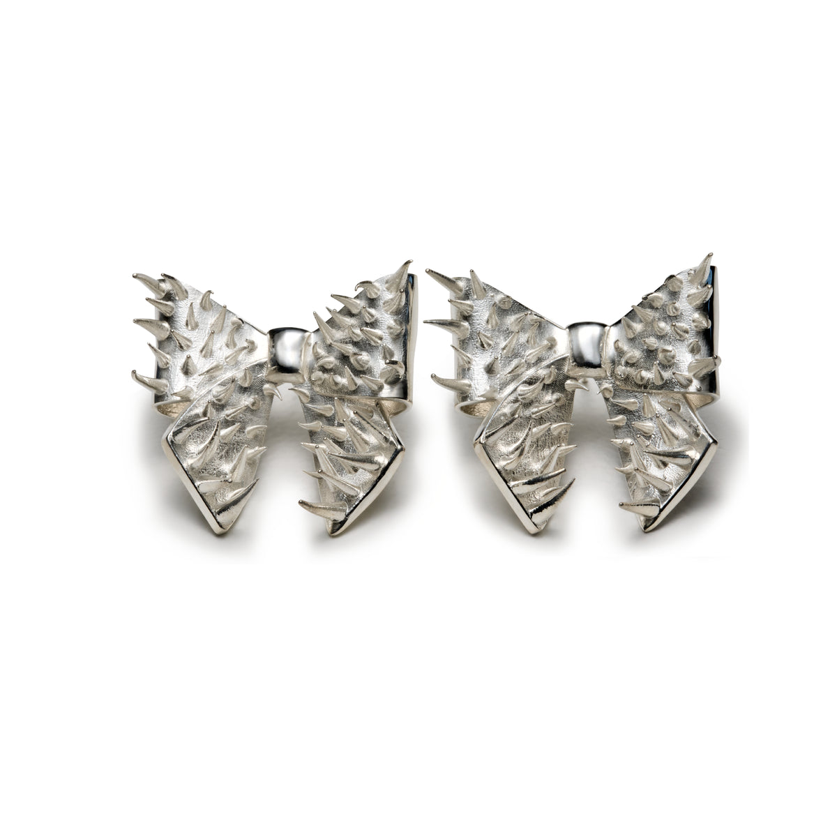 Aslan Spiked Bow Earrings